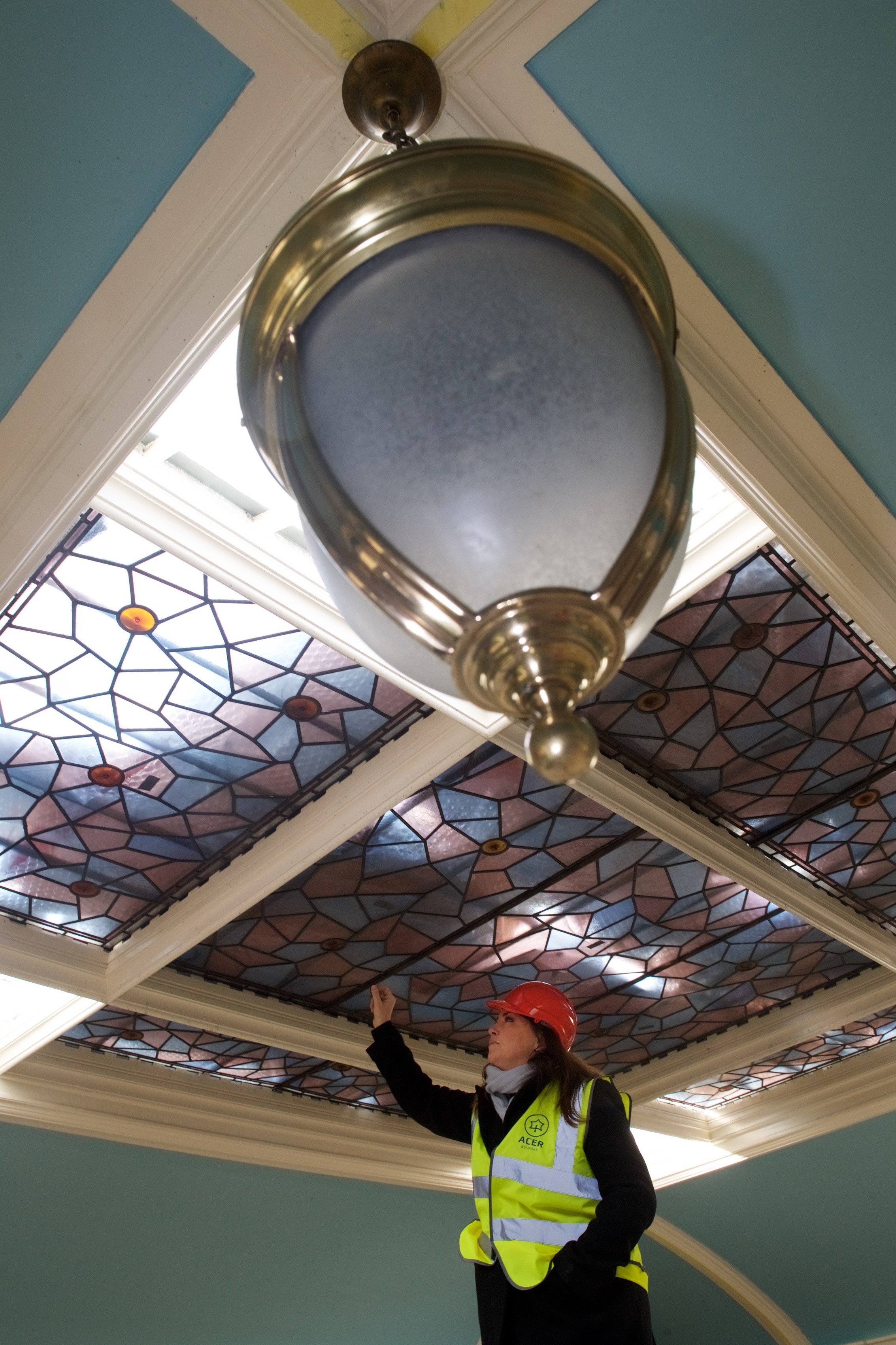 Claire Follain, Superintendant Registrar, takes a closer look at the restoration work that is taking place on the ceiling of Howard Davis Hall. The building is being refurbished with a view to being used as avenue to stage events. Picture: JON GUEGAN. (32164875)
