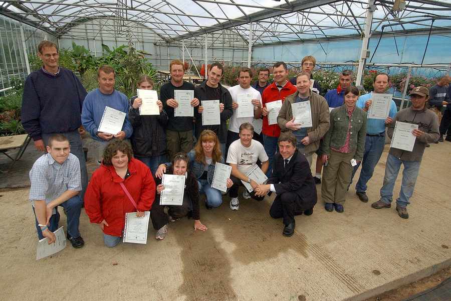 Staff at Acorn Nurseries receive their National Proficiency Test Council Edexcel certificates at a JET awards ceremony. The certificates were awarded by Senator Paul Routier