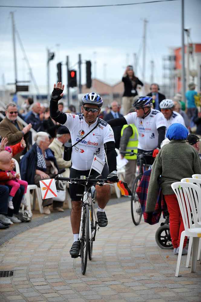 Deputy Murray Norton arrives at Liberation Square after cycling from Bad Wurzach