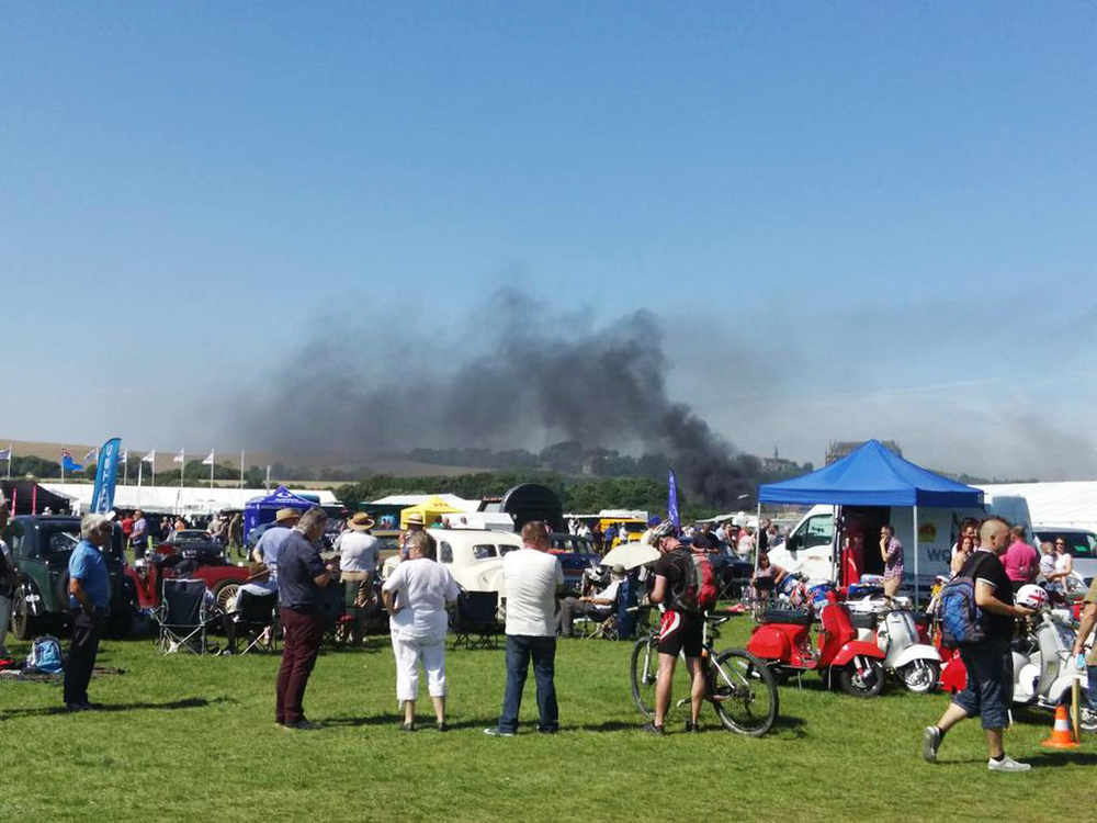A photo of the Shoreham crash, taken from the Twitter feed of @Cromwell606