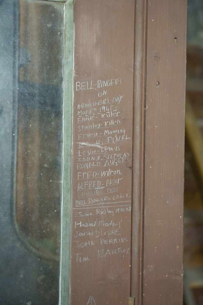 Names carved into the wood in the clock tower