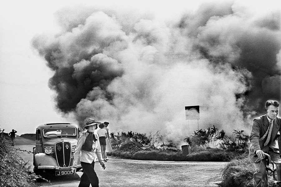 Smoke billows up from a furze fire at Les Landes in August 1937