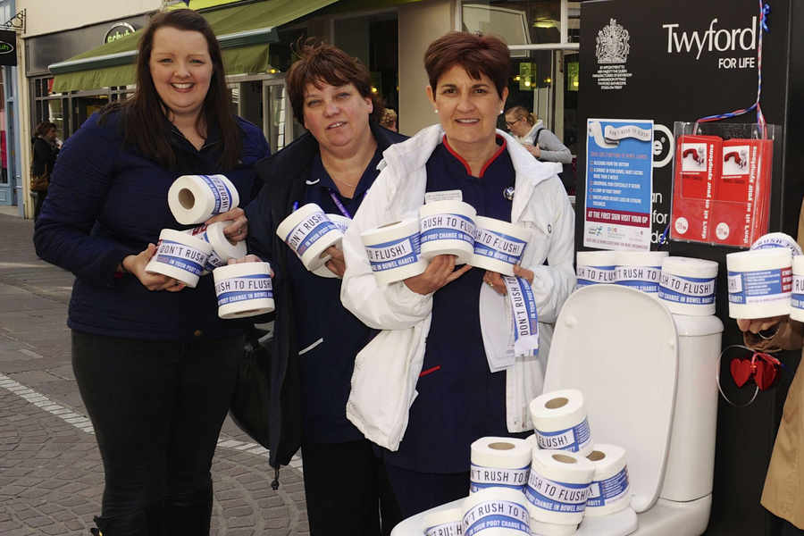 Cate Goode (right) with members of the Bowel Cancer Awareness team: