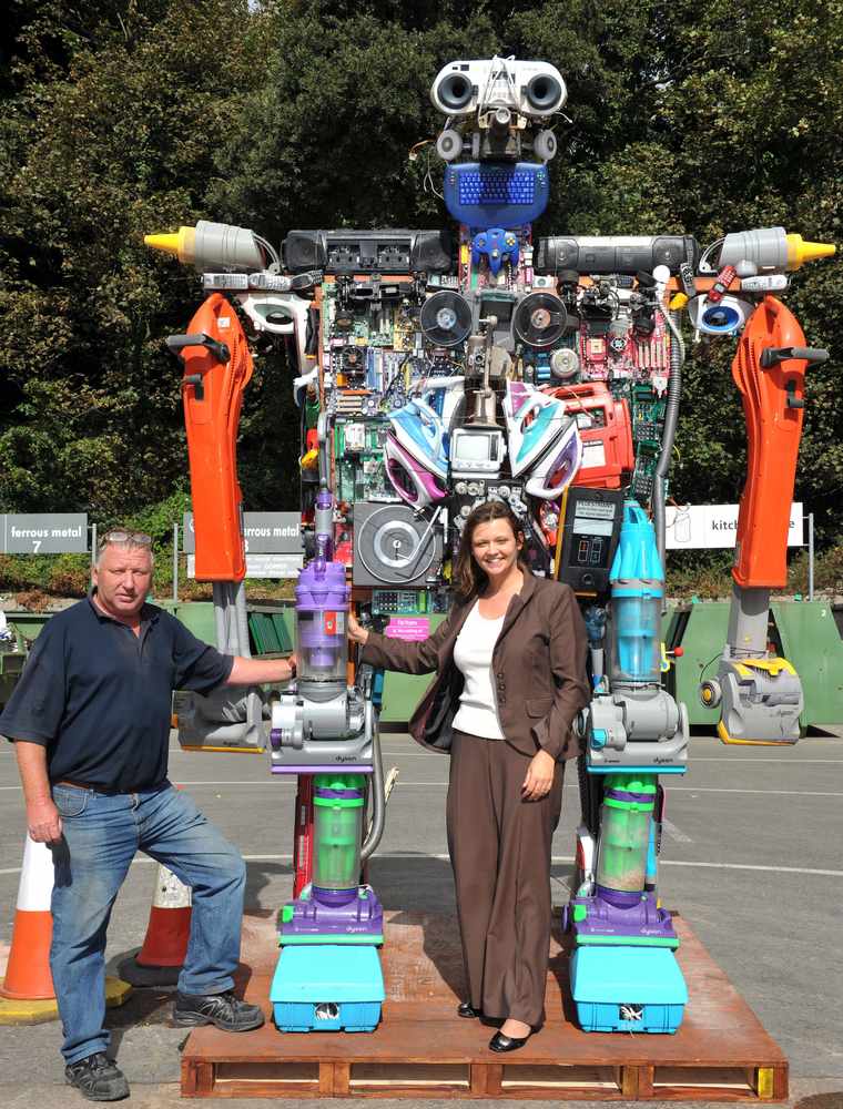 Chargehand Dave Willows and Recycling manager Emma Richardson-Calladine with the robot