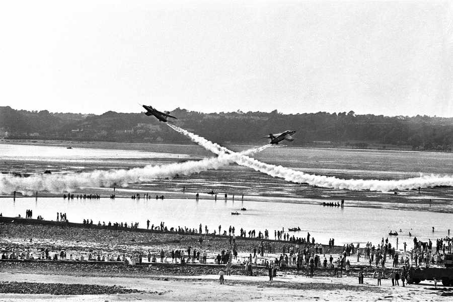 A very different display... Safety was less of a consideration in 1970 as crowds get very close to the planes in St Aubin's Bay