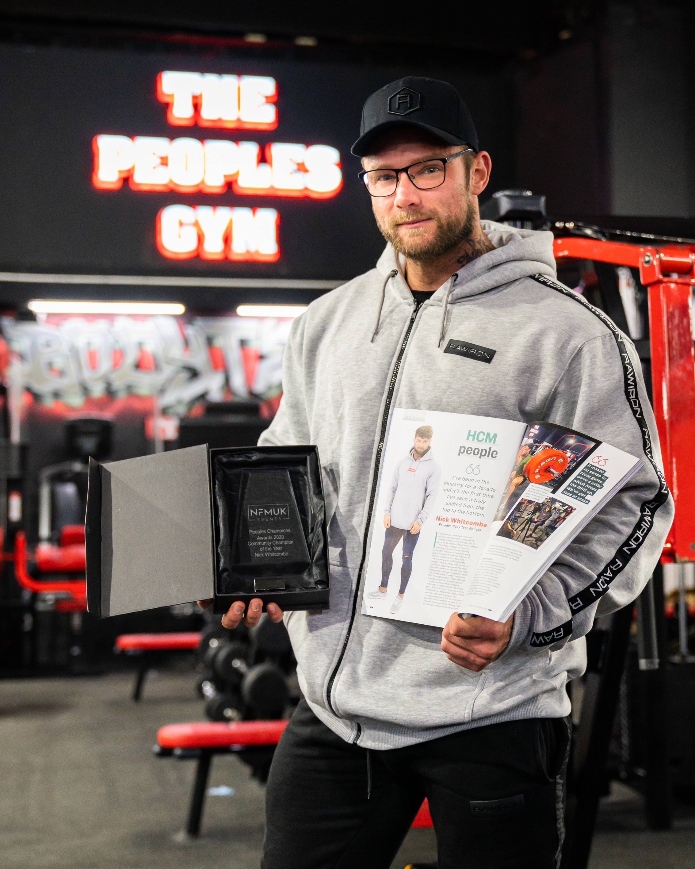 Nick Whitcombe in his gym on the Wirral holding a magazine he was featured in Picture: NICK WHITCOMBE. (30054043)