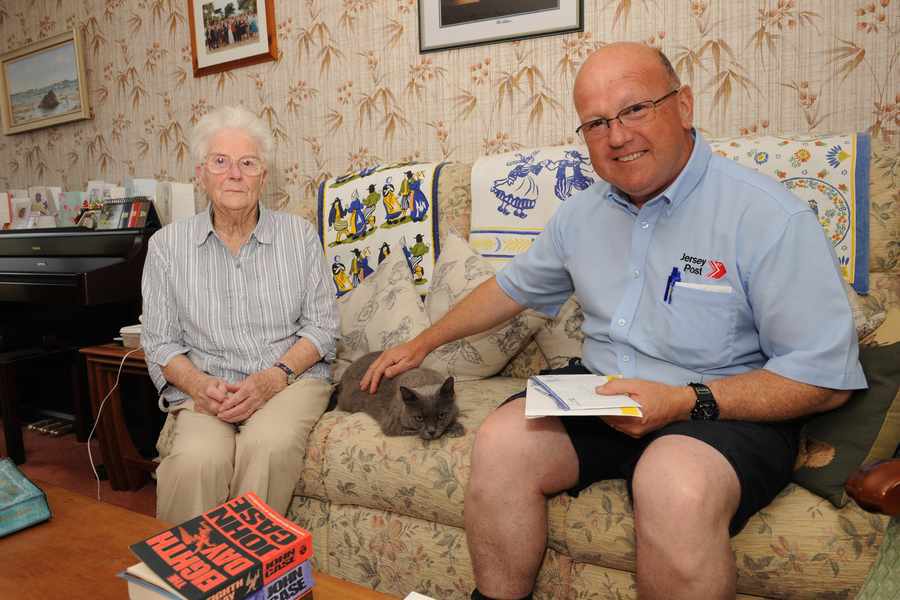 Margaret Tipping and postman Ricky Le Quesne, who visits her as part of the Call and Check service