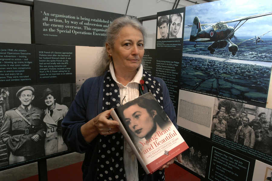 Tania Szabó with Young Brave and Beautiful, the book about her mother Violette's life, which was commissioned by the Jersey War Tunnels in 2007