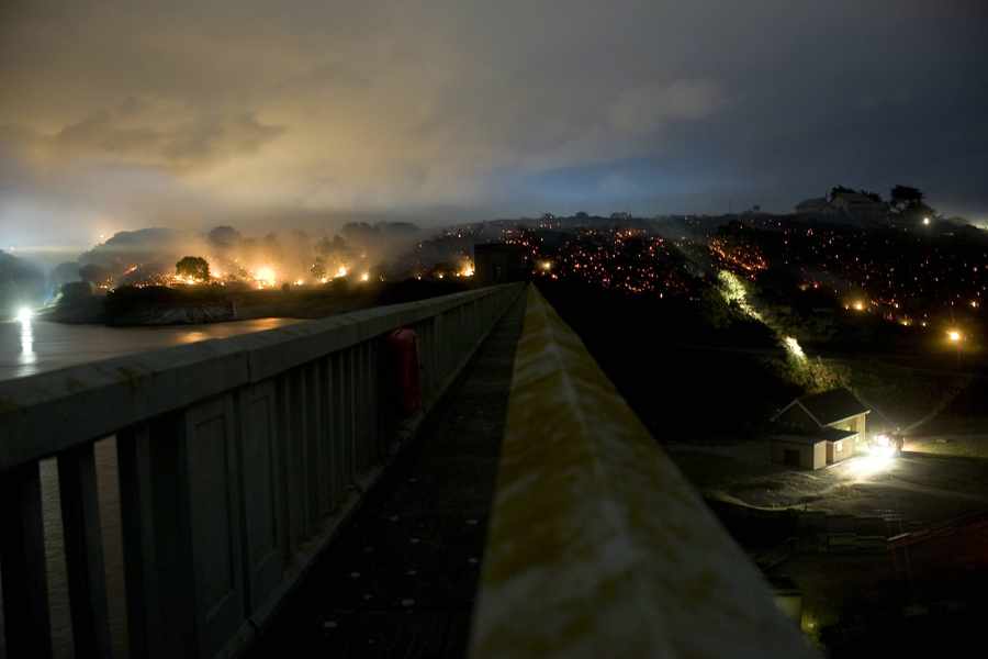 This was the scene at the Val de la Mare Reservoir in 2009 after a furze fire broke out on land in St Peter and St Ouen. Nearly 20 homes had to be evacuated as the wildfire tore across the countryside. At its peak the blaze was being tackled by every firefighter in the Island in order to bring it under control. One square kilometre of dry headland was destroyed and two properties were damaged. It was reported at the time that an out-of-control bonfire in a private garden was the cause of the blaze. After the alarm was raised at around 2 pm, it took firefighters until midnight to extinguish the flames.