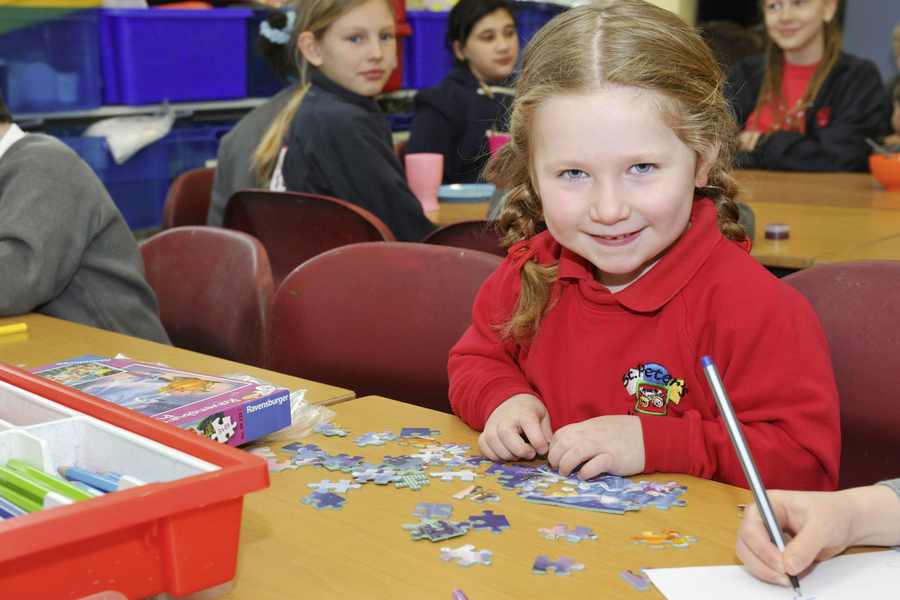 Grace Wood (3) enjoys playtime at the Breakfast Club at St Peter's School