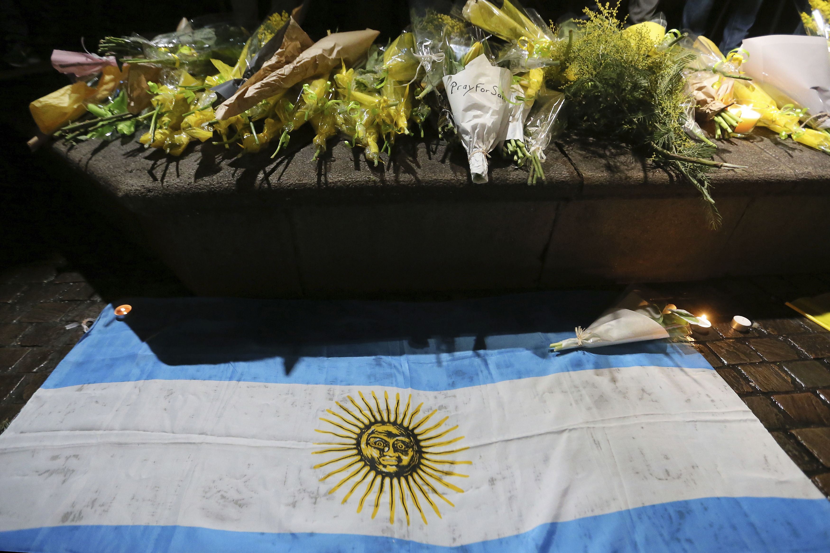Supporters gather to pay tribute to Argentinian footballer Emiliano Sala in Nantes Picture: AP Photo/David Vincent