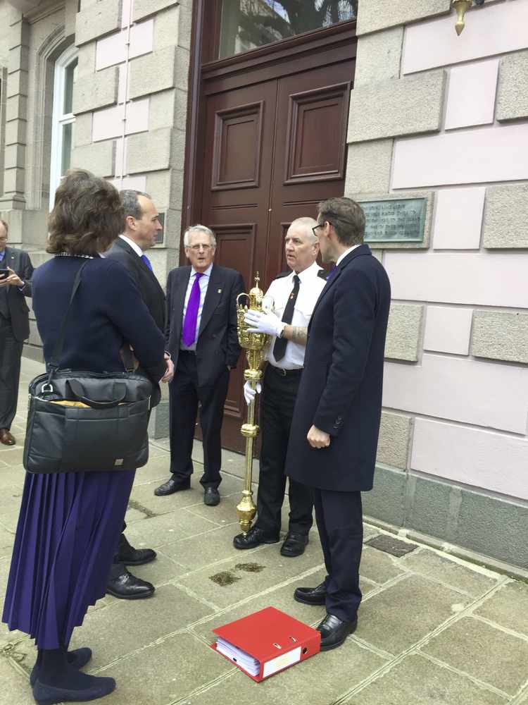 The mace is brought outside after the fire alarm went off in the States building. Picture by Senator Paul Routier.