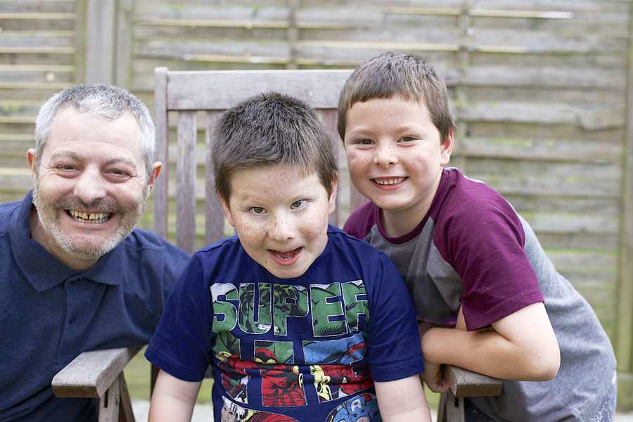 Euan McCarthy with his twin brother Leland and father Darrell