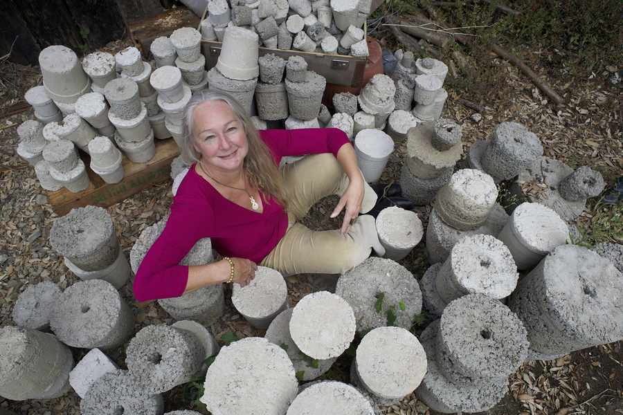 Christine Finn with 350 concrete pots
