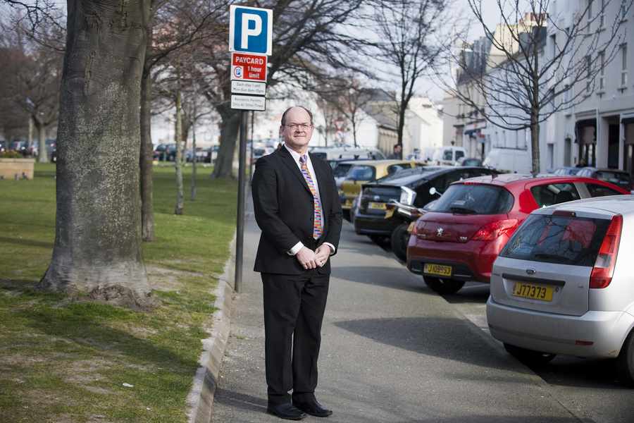 St Helier Constable Simon Crowcroft at a residents' parking site in The Parade
