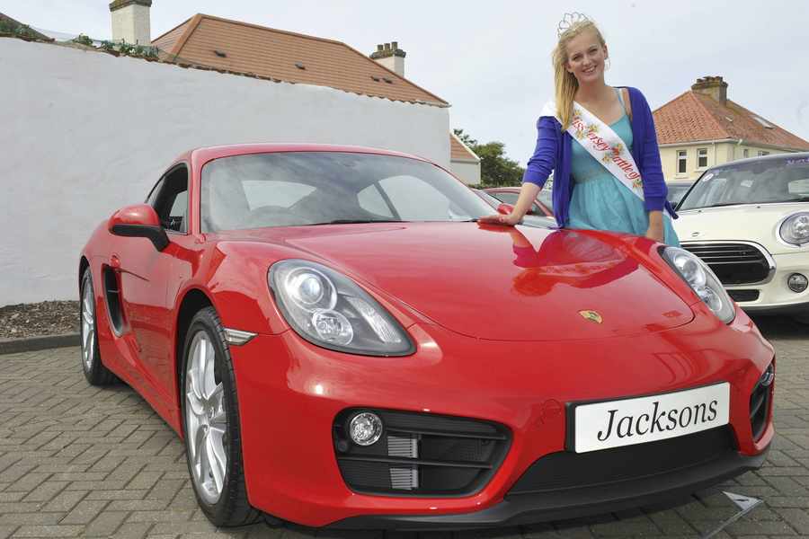 Miss Battle of Flowers Chantelle Mundy with her favourite car, a Porsche