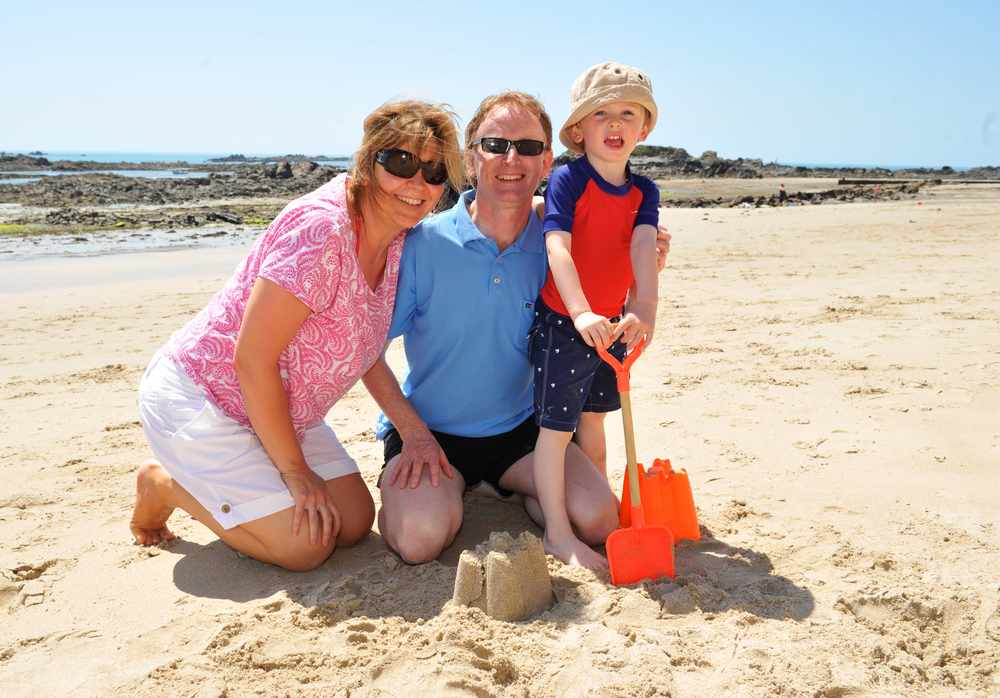 Tourists Aodhan & Mary Henderson from Dublin with their son George (4) at Green Island