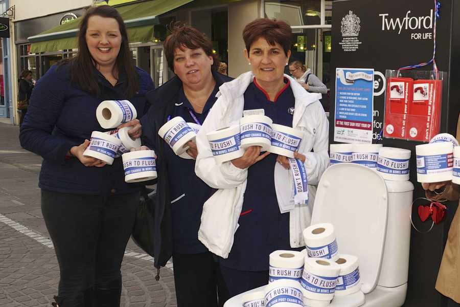 Cate Goode (right) with members of the Bowel Cancer Awareness team