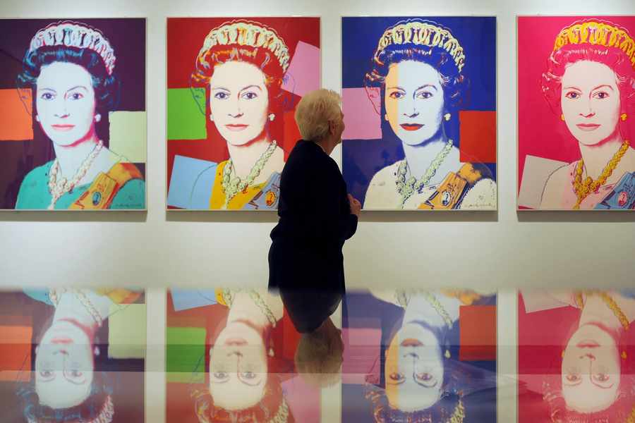 Cult pop artist Andy Warhol created a series of four screen prints of Queen Elizabeth II. Although not an officially commissioned portrait, the prints were bought by the Royal Collection in 2012 to mark the Queen's Diamond Jubilee. The images formed part of a collection called 'Reigning Queens' and are sprinkled with fine particles of cut or crushed glass, which sparkle in the light. The photograph used in the prints was taken in 1975 by the late Reading-based photographer Peter Grugeon.