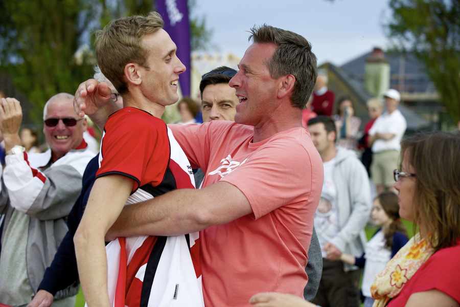 Jersey's Jason Fox gets a hug from Dad Paul after winning gold in the high jump