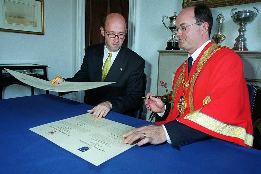 St Helier became twinned with Bad Wurzach in 2002 - Major Roland Burkle and Constable Simon Crowcroft perform the signing ceremony
