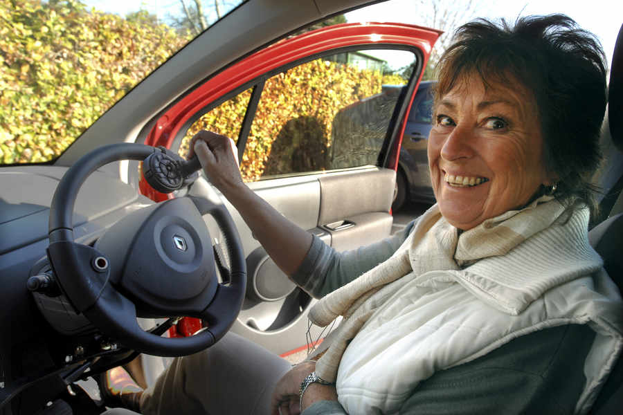 Driving for the Disabled founder Pam Evans, who was left paralysed on her right-hand side by a stroke, in her specially adapted car