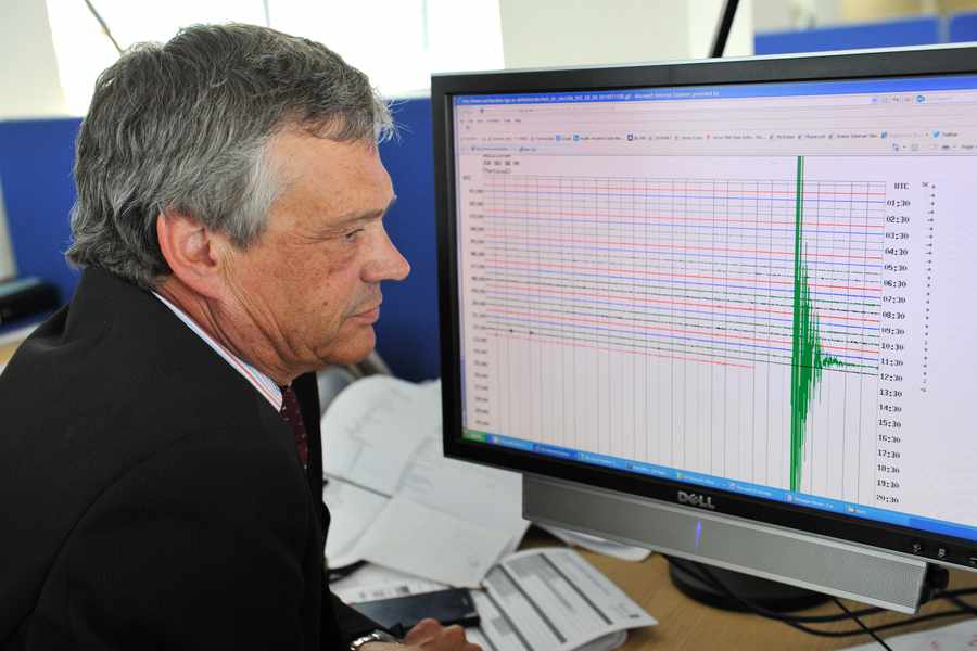 Tony Pallot in 2014 with the seismic reading taken from HO5 (the german ammunition tunnels at St Aubin) which measured 4.5 on the Reicter scale (biggest for 100 years)