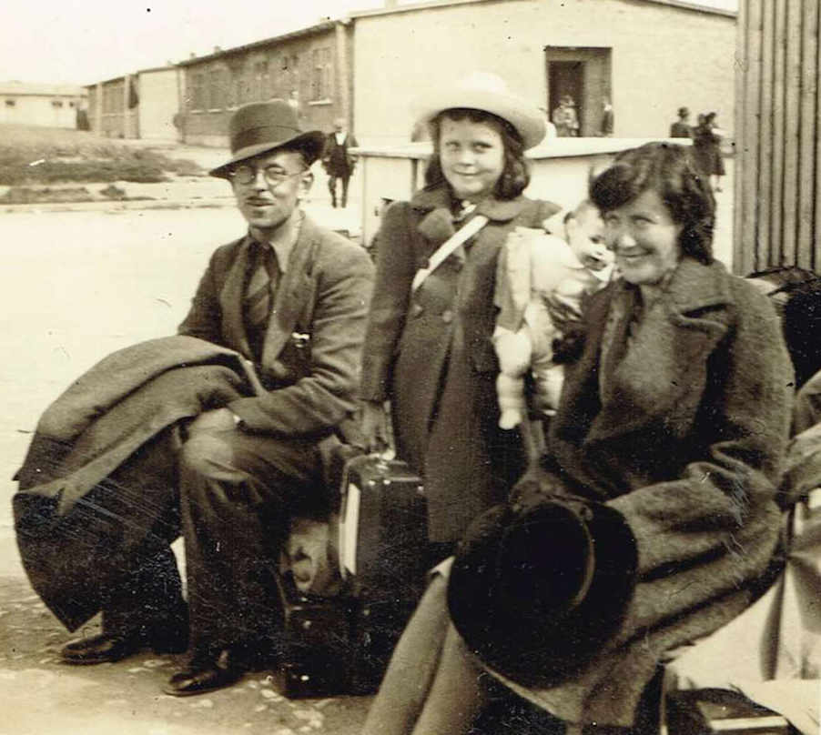 A photograph of Elizabeth Clothier as a child with her parents in the German internment camp