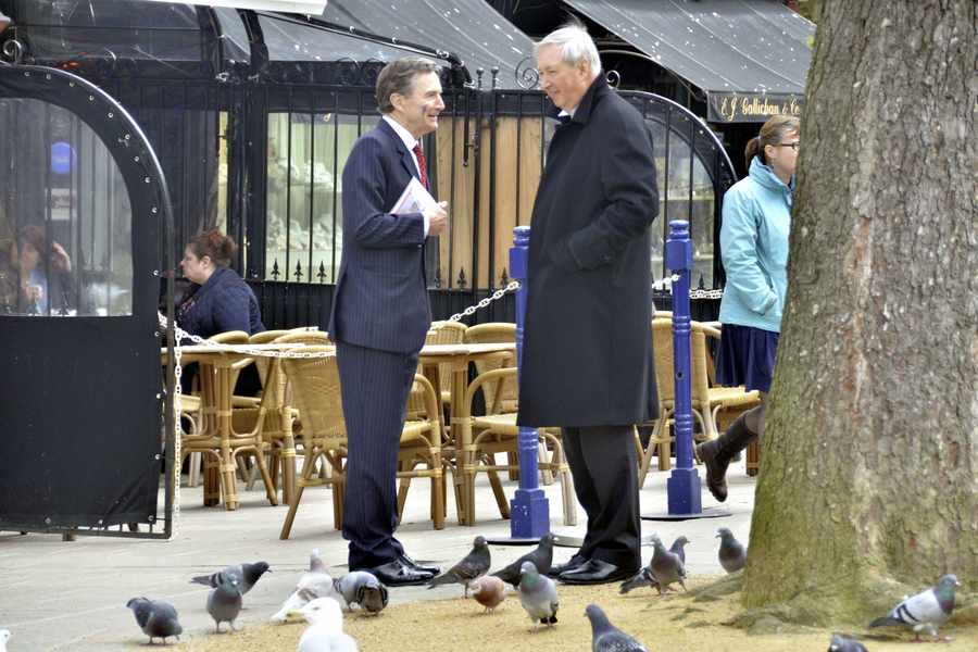 The Lieutenant Governor and the Bailiff chatting in the Royal Square after the States was evacuated