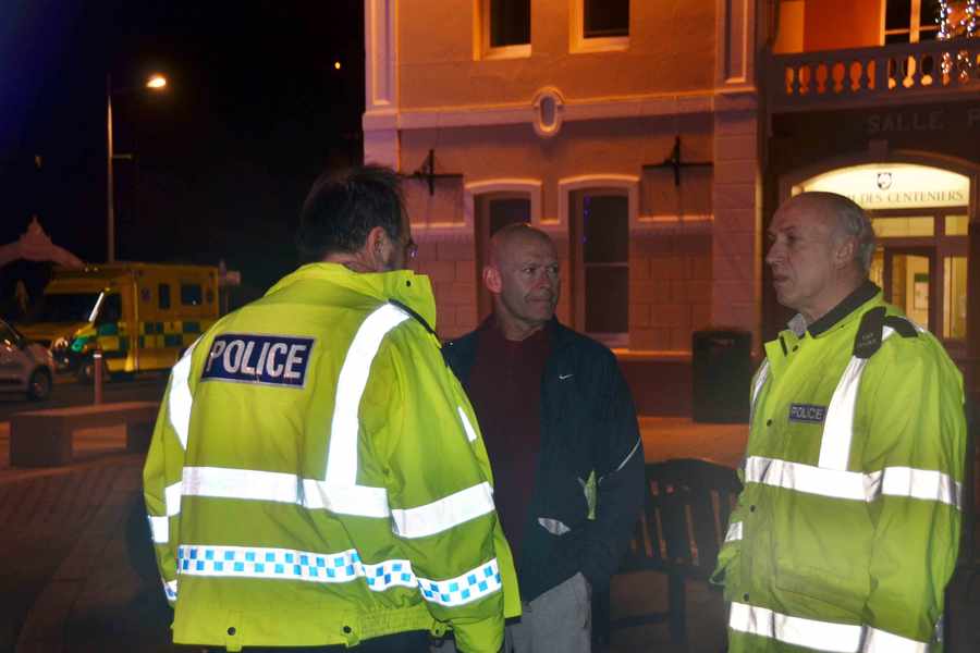 St Brelade Constable Steve Pallett talking to police officers
