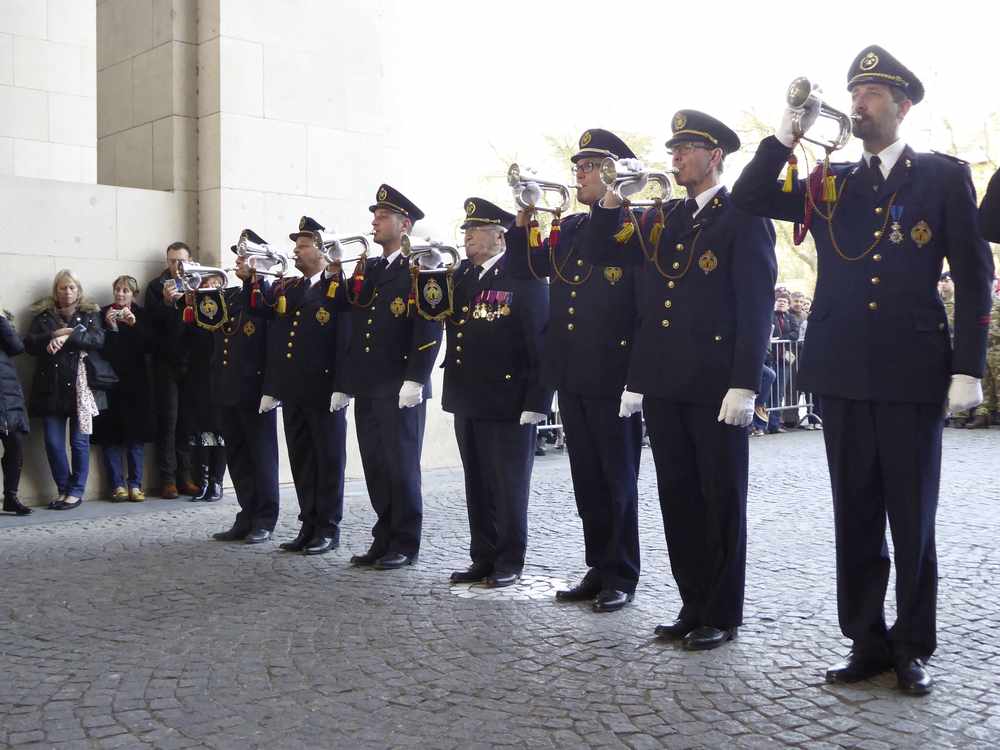 Eight buglers play the Last Post at the Menin Gate on the eve of Anzac Day