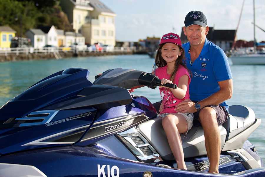 Tony Barraclough on his jet ski with his daughter Sophie