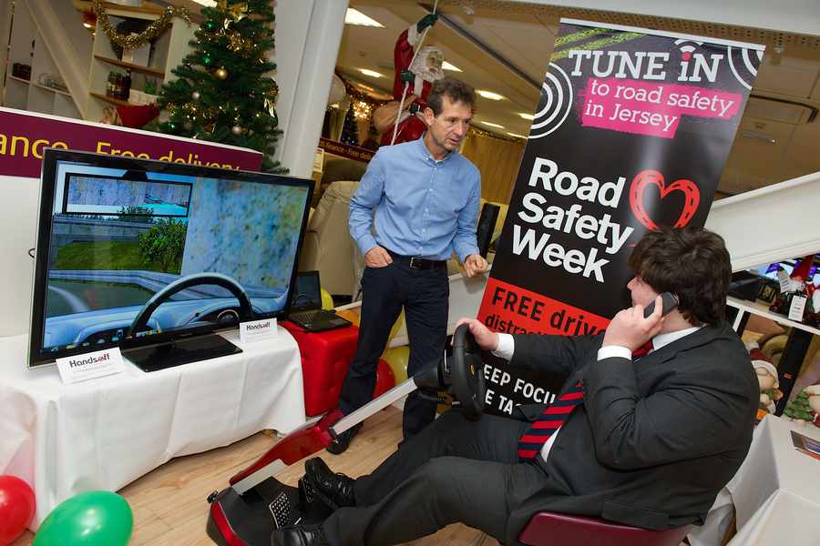 JEP reporter Michael Morris attempts to stay on the virtual road while using his mobile phone and holding a conversation with road safety campaigner Paul Newman