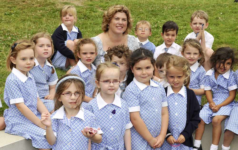 Suzanne Burke with her reception class pupils at FCJ Primary
