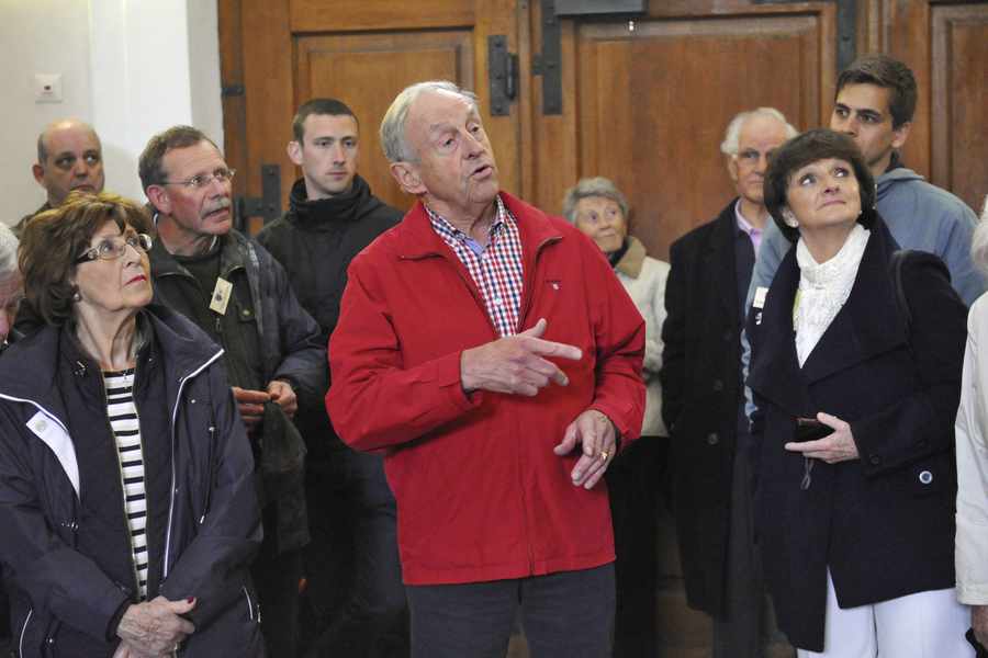 Former internee David Peacock shares his reminiscences during a tour of Bad Wurzach Schloss yesterday