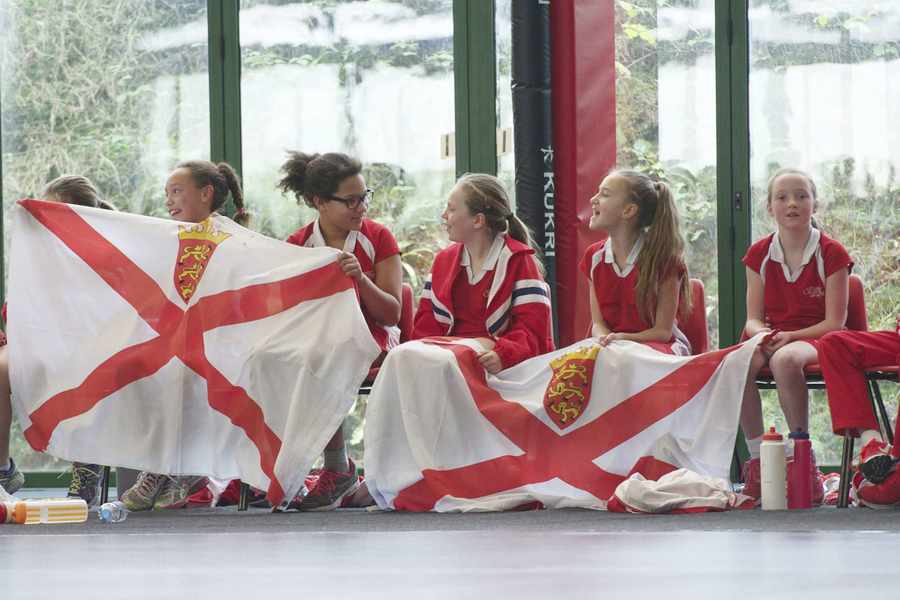 Jersey Whites cheer on the Reds in the second game at Les Ormes