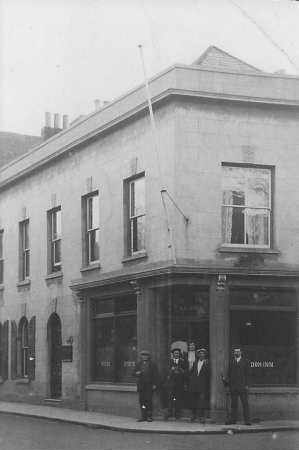 After the war, Henry Jones (pictured on the right holding a bottle) returned to Jersey and became the landlord of the Don Inn with his wife Alice (pictured in the entrance)nextpage