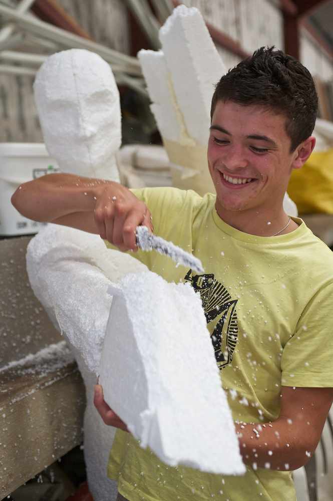 A 17-year-old Jonny working on the Grouville Juniors Battle of Flowers float in 2010