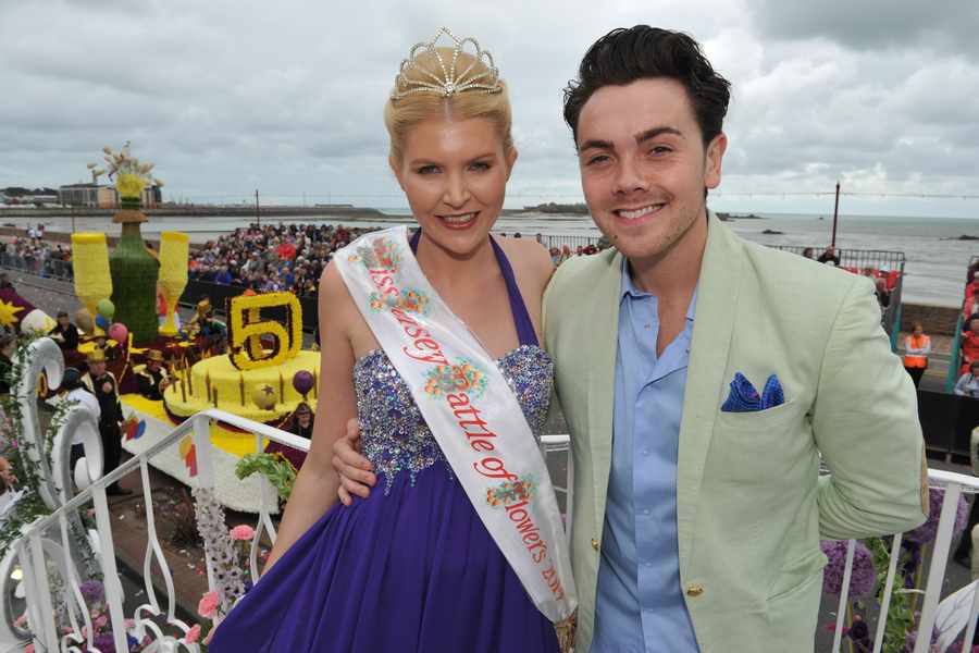 The report questioned the value added to the parade of X Factor contestant Ray Quinn, pictured here with 2014's Miss Battle of Flowers, Holly Perchard