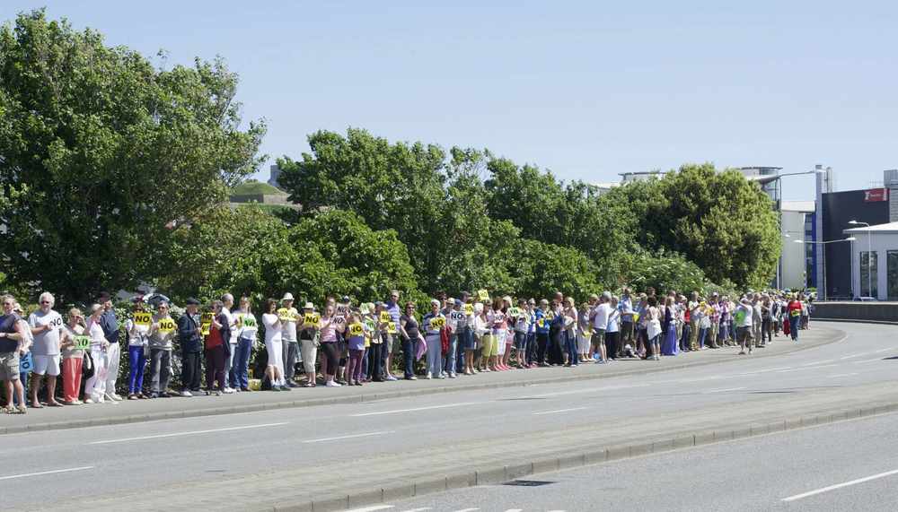 on Sunday around 2,000 Islanders circled the Esplanade car park in protest against the scheme.