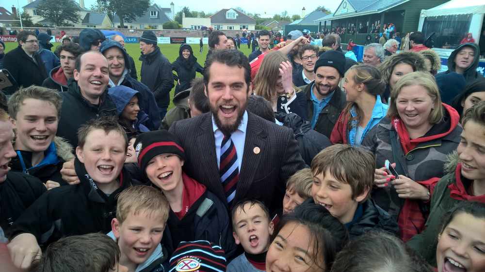 SUPERFANS: Jersey's Man of Steel joined young members of the Jersey Rugby Club Academy following the Island's victory over Guernsey in the Siam Cup this weekend. Picture: KENAN OSBORNE