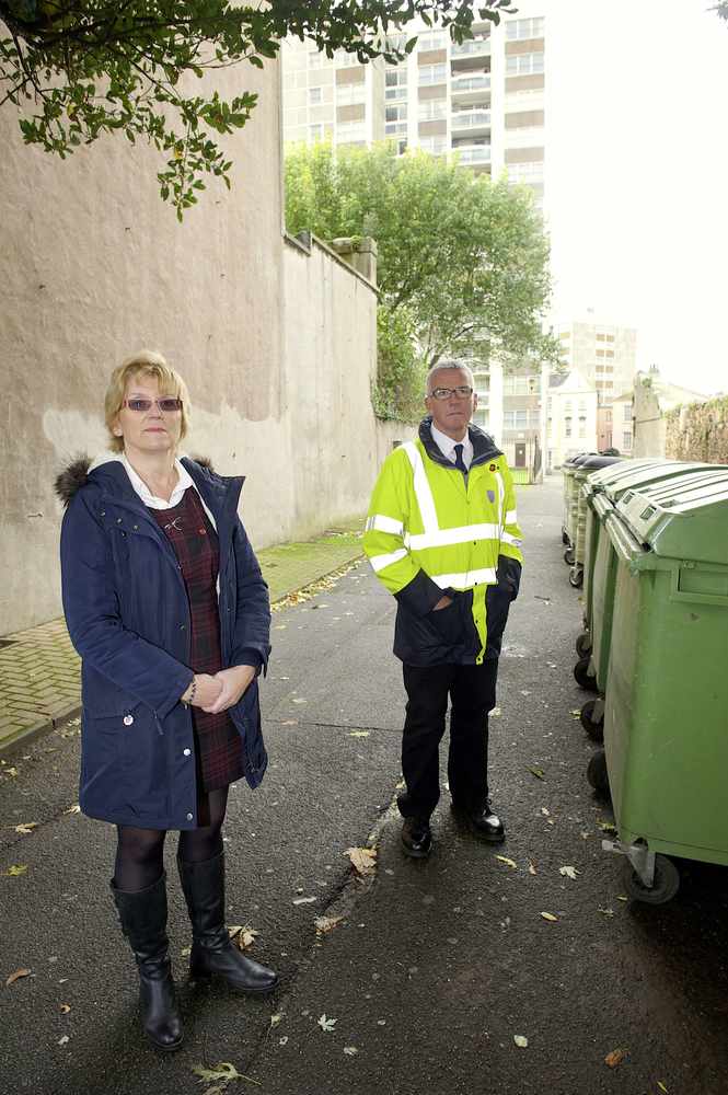 Debra d'Orleans, director of municipal services for St Helier, and Phil Hague, refuse street cleansing and recycling manager for the parish, at the Convent Court bin site