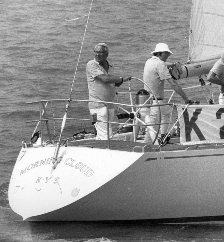 Ted Heath at the helm of Morning Cloud. It has been alleged that he anchored the yacht outside Jersey waters and therefore beyond the Island's jurisdiction