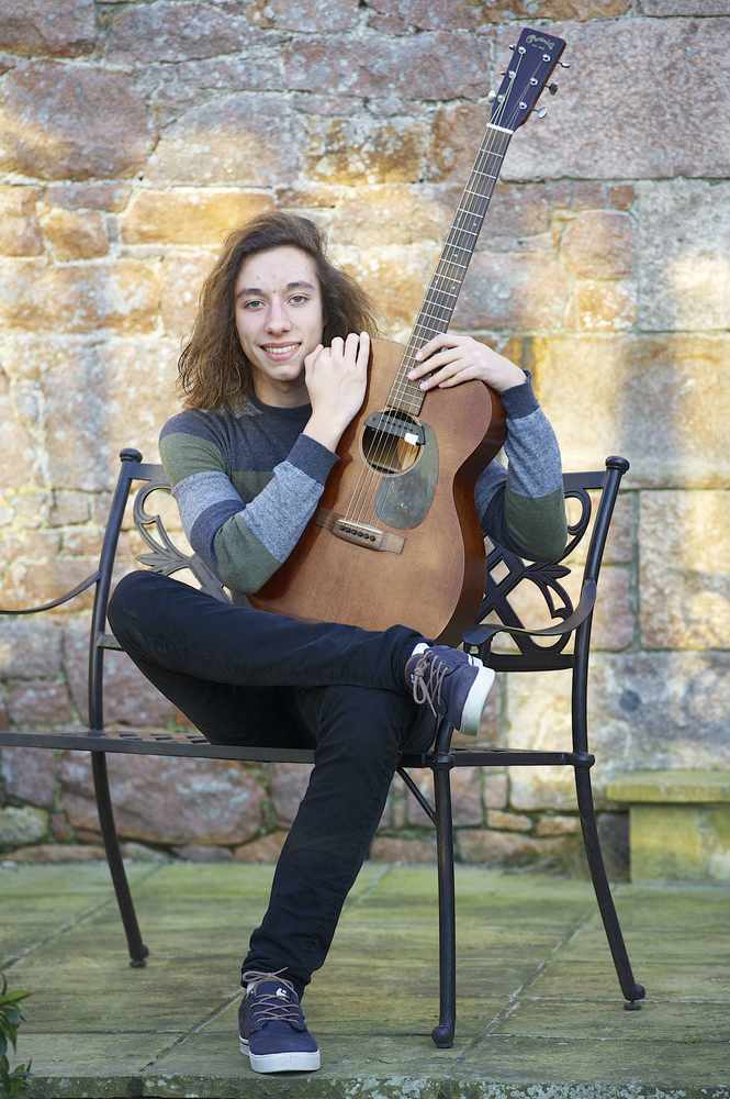 Acoustic guitarist Samuel Walwyn enjoys the thrill of affecting others by playing
