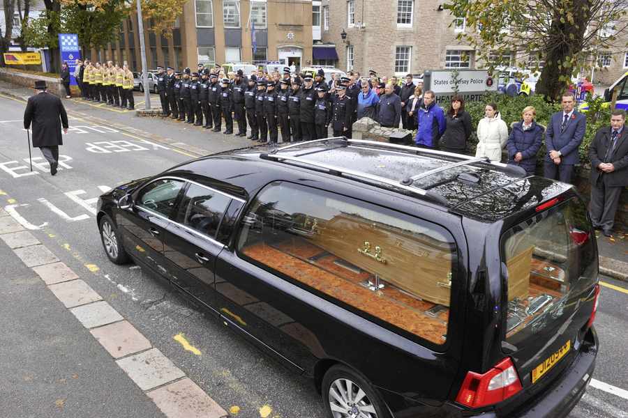 Police and Fire Service pay their respects at Rouge Boullion