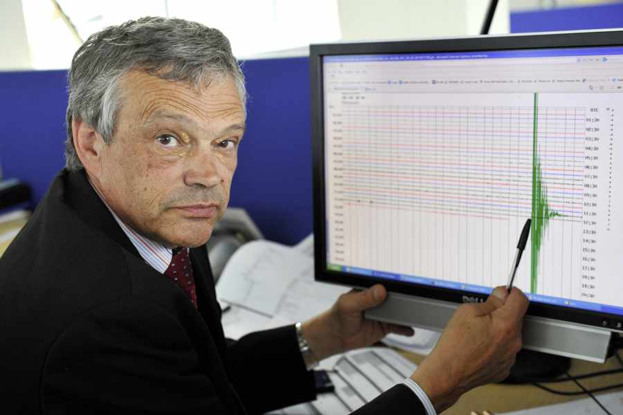 Principal Metrological Officer Tony Pallot with the seismic reading following the earthquake in July 2014