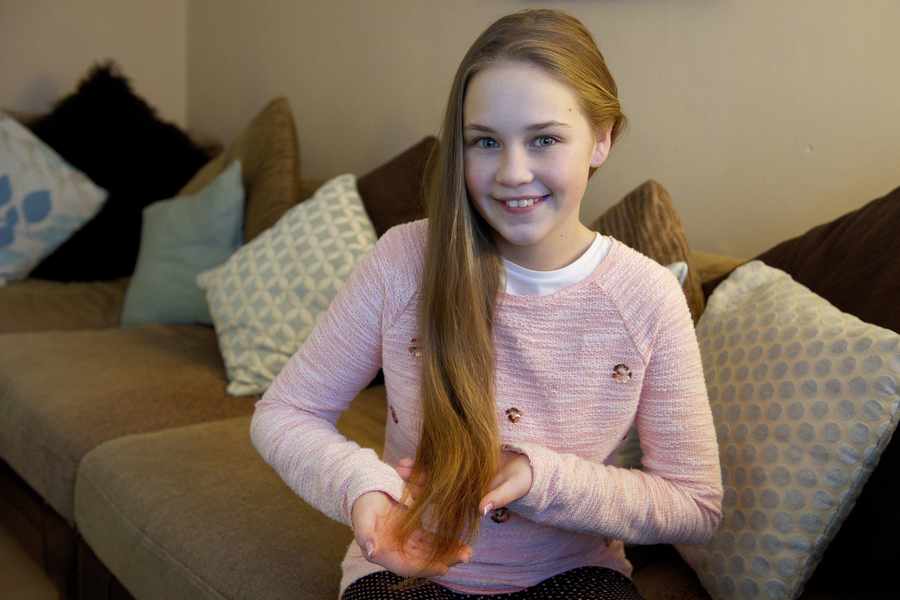 Alice Millen-Swainston (12), who is having her 24-inch-long hair cut off to raise money for Age Concern