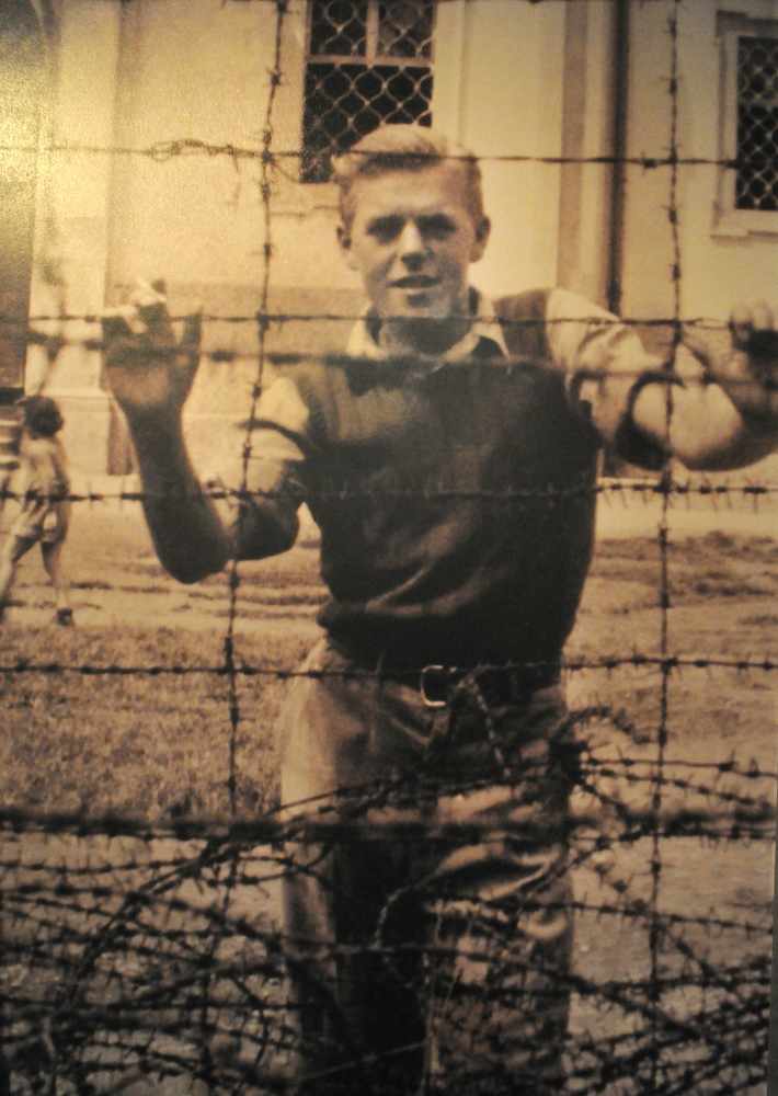 Dennis Philips pictured just after the liberation of the camp