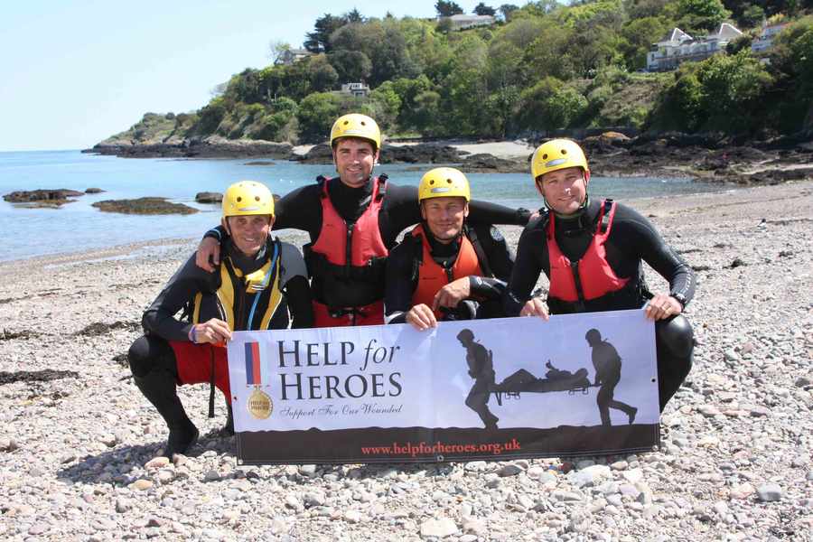 Peter Picot, Richard Picot, Zoltan Zsilinszky and Iain Picot coasteered round the Island to raise money for Help for Heores