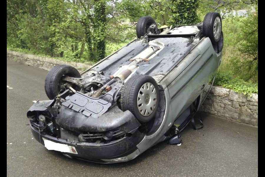 A pensioner was taken to hospital after his car flipped over in Route de L'Etacq, St Ouen